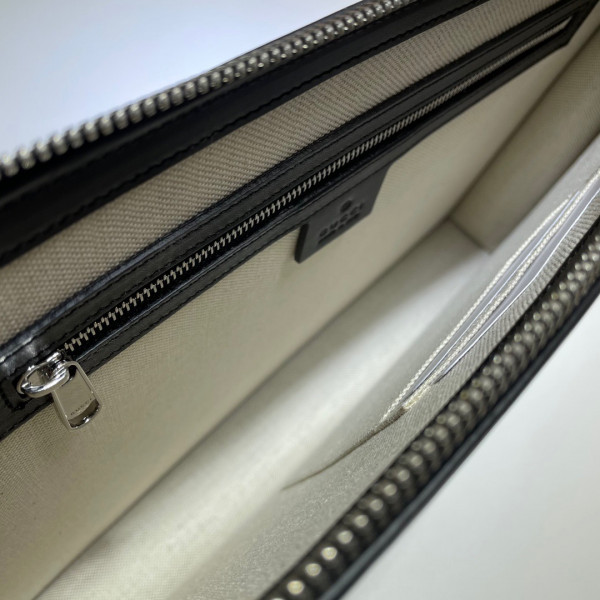 G*u*i gg embossed pouch