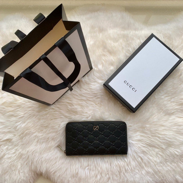 G*u*i leather zip around wallet