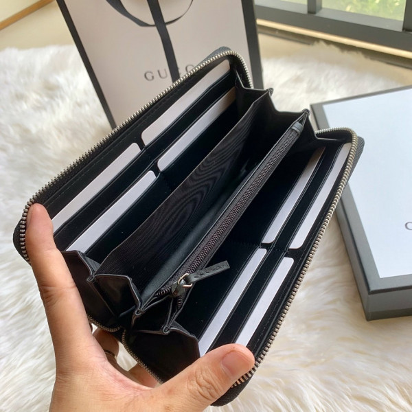 G*u*i leather zip around wallet