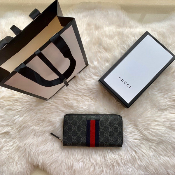 G*u*i leather zip around wallet