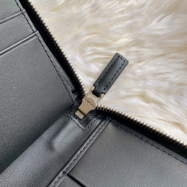 G*u*i leather zip around wallet