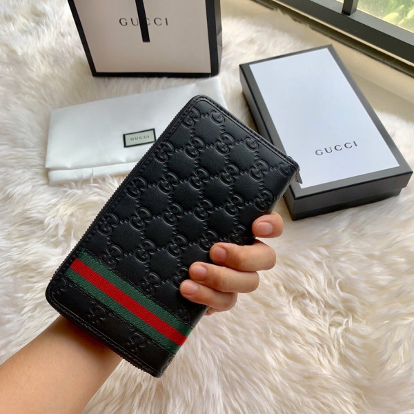 G*u*i leather zip around wallet