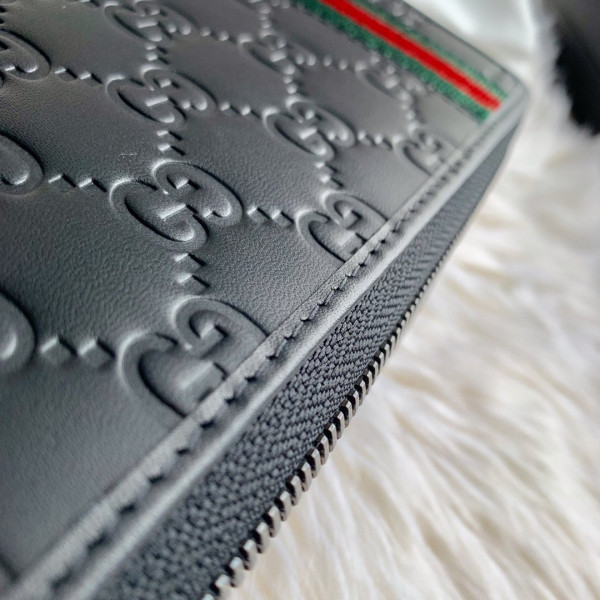 G*u*i leather zip around wallet