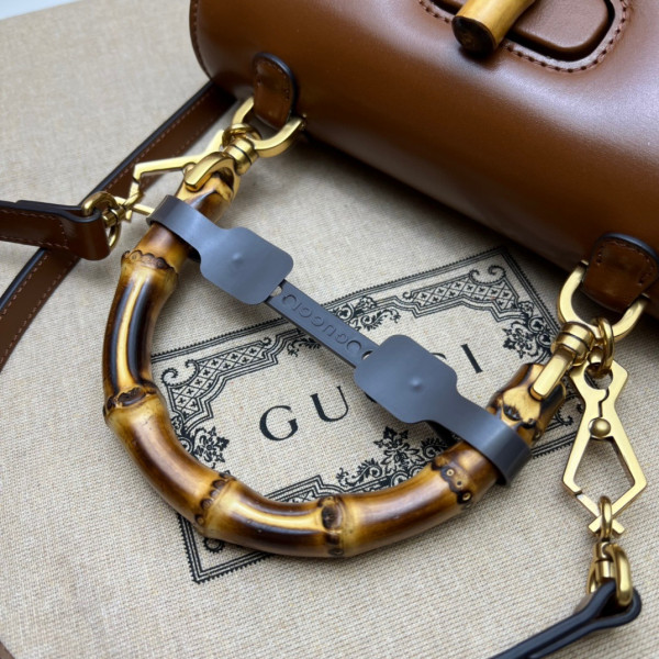 G*u*i small top handle bag with bamboo