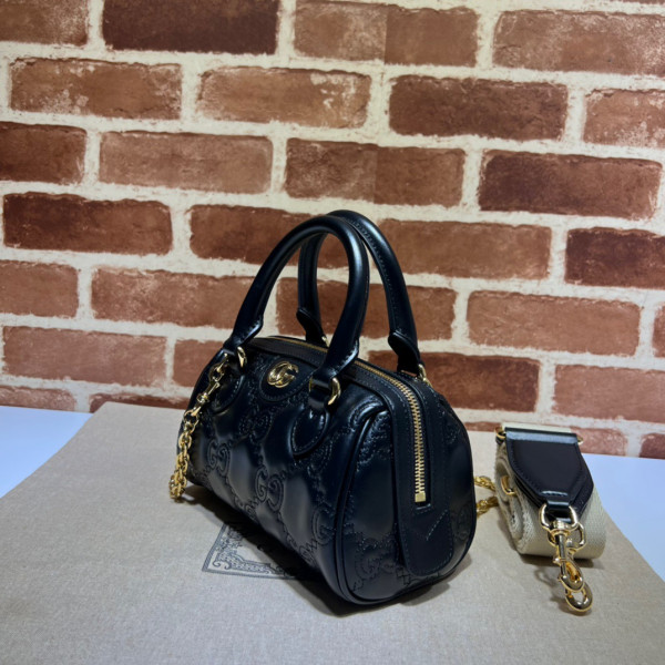 G*u*i gg matelassé leather top handle bag
