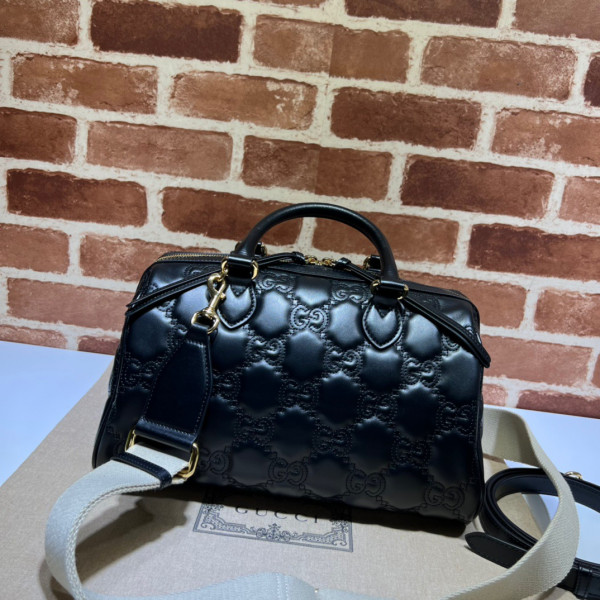 G*u*i gg matelassé leather top handle bag