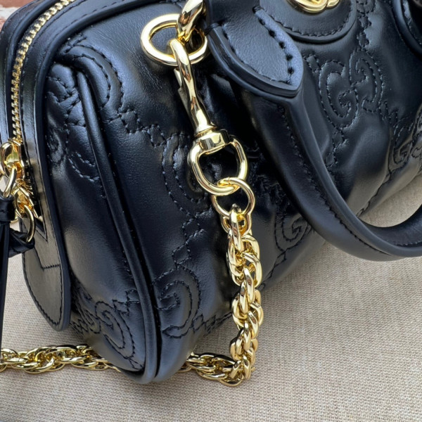 G*u*i gg matelassé leather top handle bag