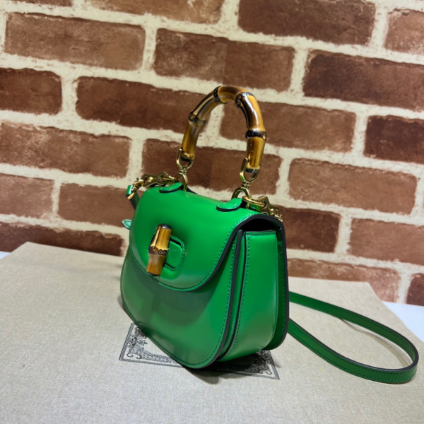 G*u*i mini top handle bag with bamboo