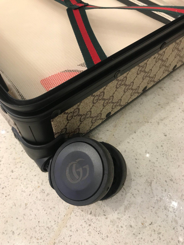 G*u*i travel box 20 inches