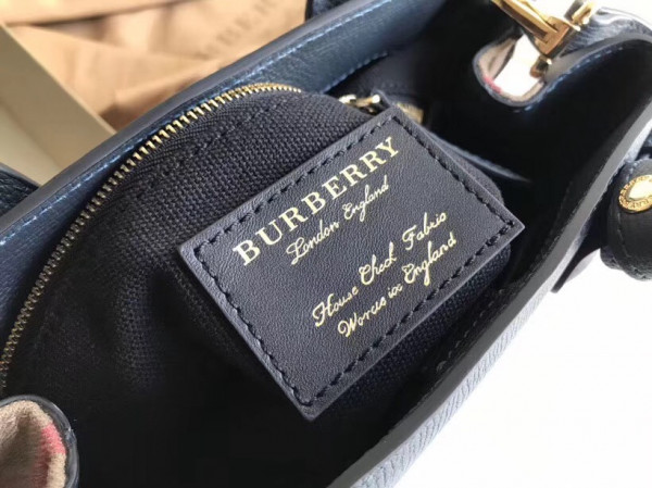 B**rry the small banner in leather and house check