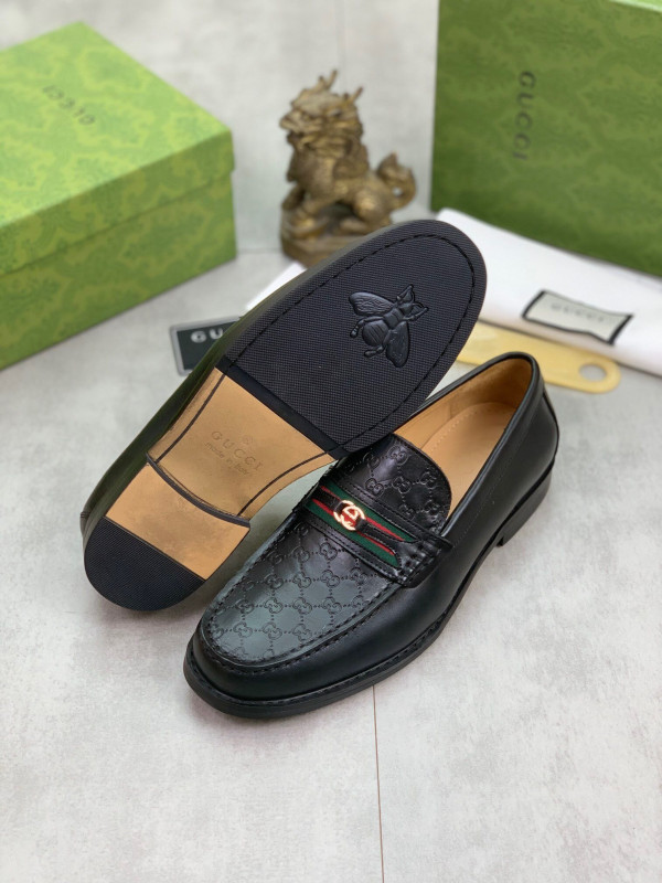 G*u*i loafers
