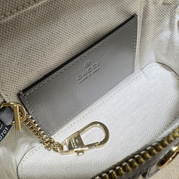 G*u*i gg matelassé top handle mini bag