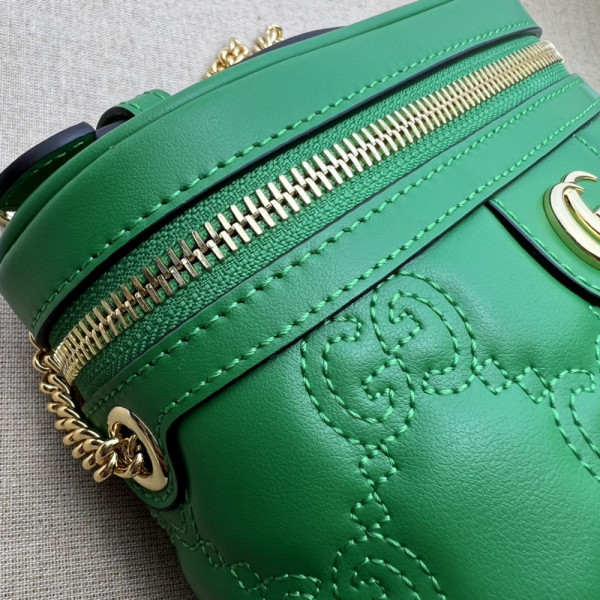 G*u*i gg matelassé top handle mini bag