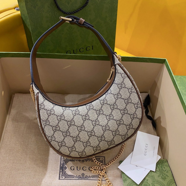 G*u*i half-moon-shaped mini bag with interlocking g