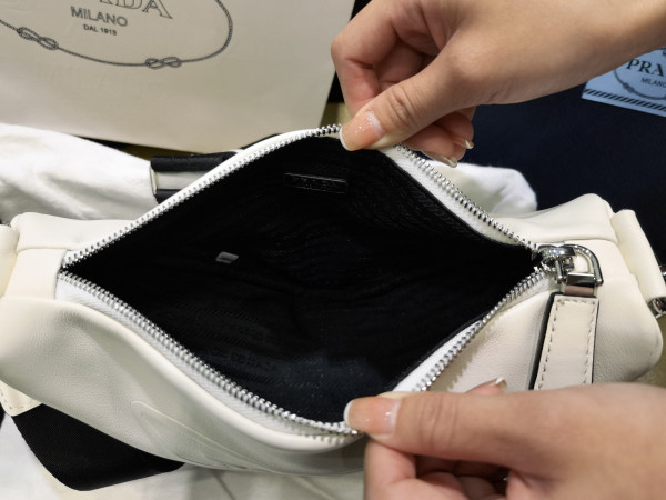 Pra*a triangle bag