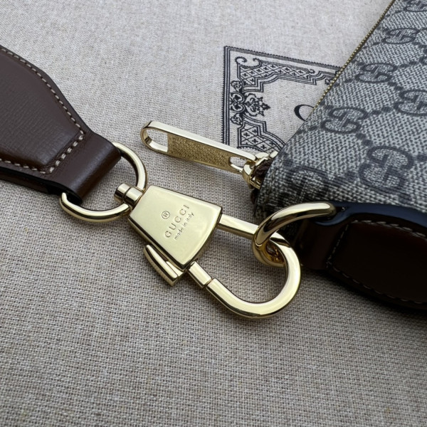 G*u*i gg messenger bag
