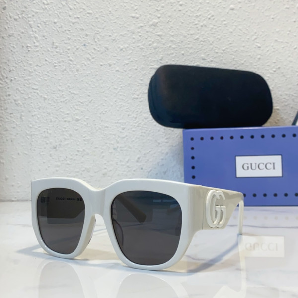 G*u*i sunglasses