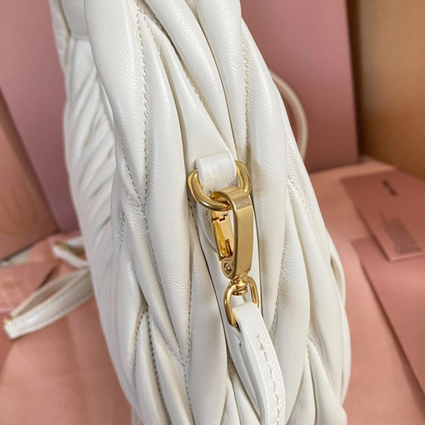 M*um*u wander matelassé nappa leather hobo bag