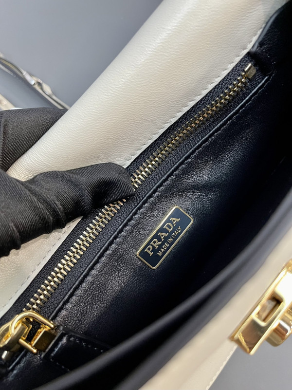 Pra*a soft sound small leather shoulder bag with charms