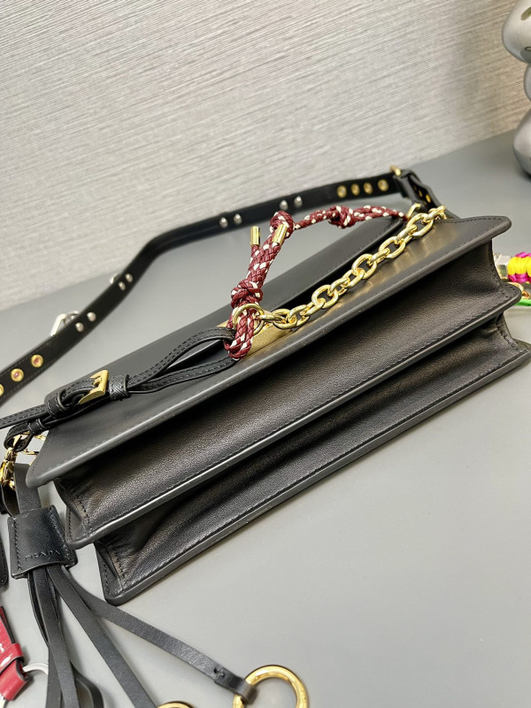 Pra*a soft sound small leather shoulder bag with charms